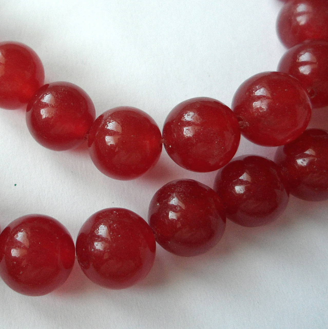 Jadeit 10mm-priehľ-1ks (rubínová)