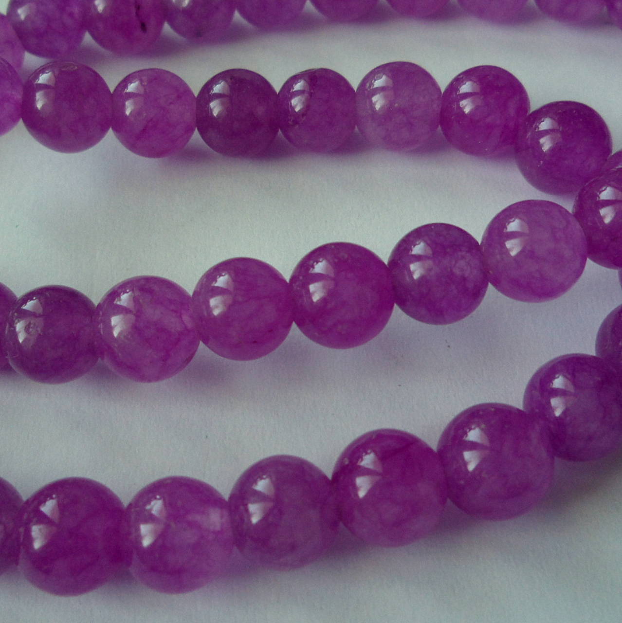 Jadeit 8mm-priehľ-1ks (fialová)