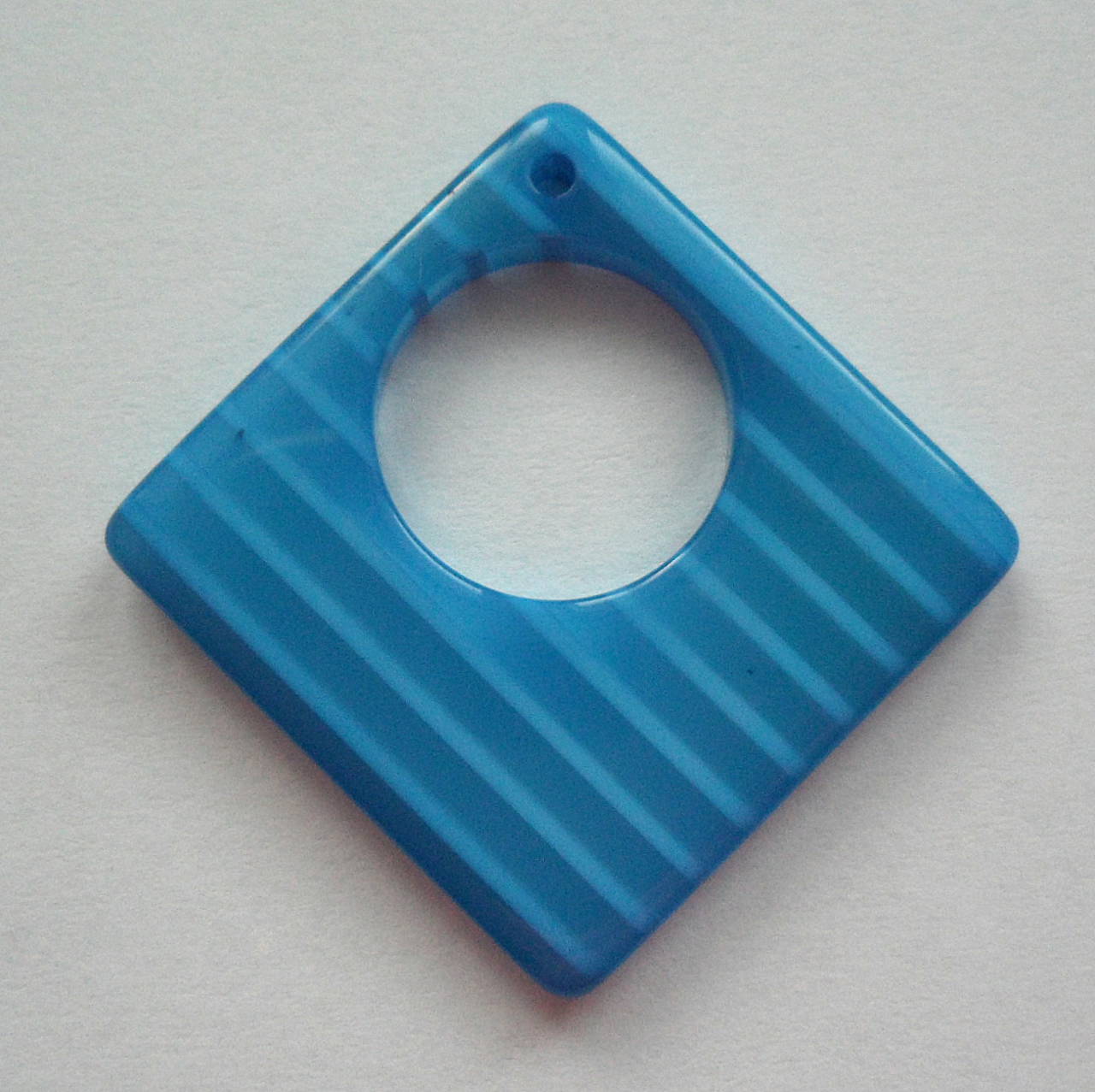 Plast.prívesok 29x29mm-1ks (modrá)