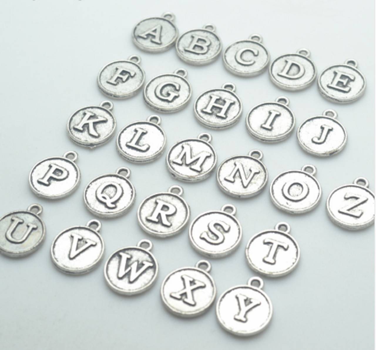 Prívesok strieborný písmenko 1,5 x 1,2 cm