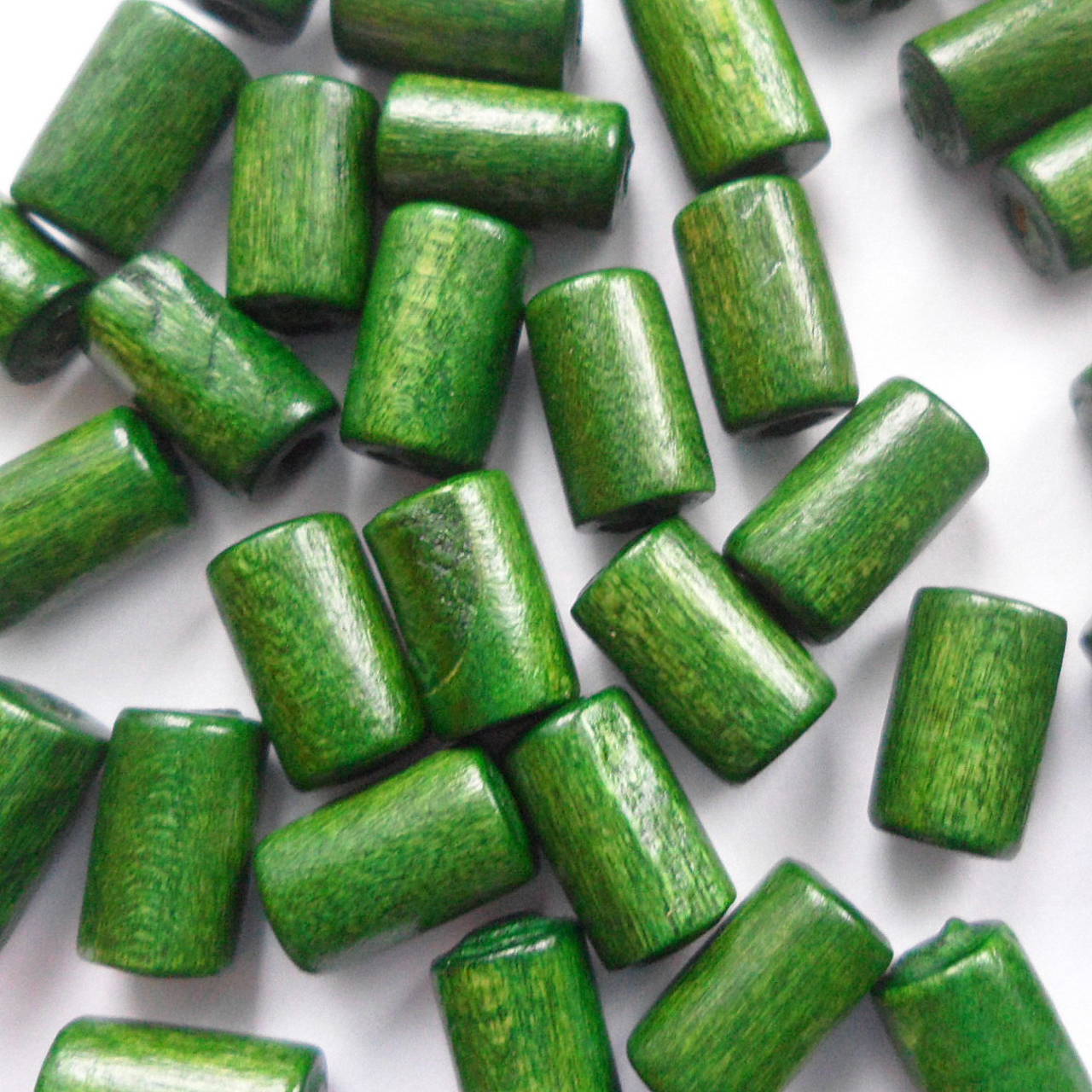 Drevený valček 10x6mm-10g (tm.zelená)