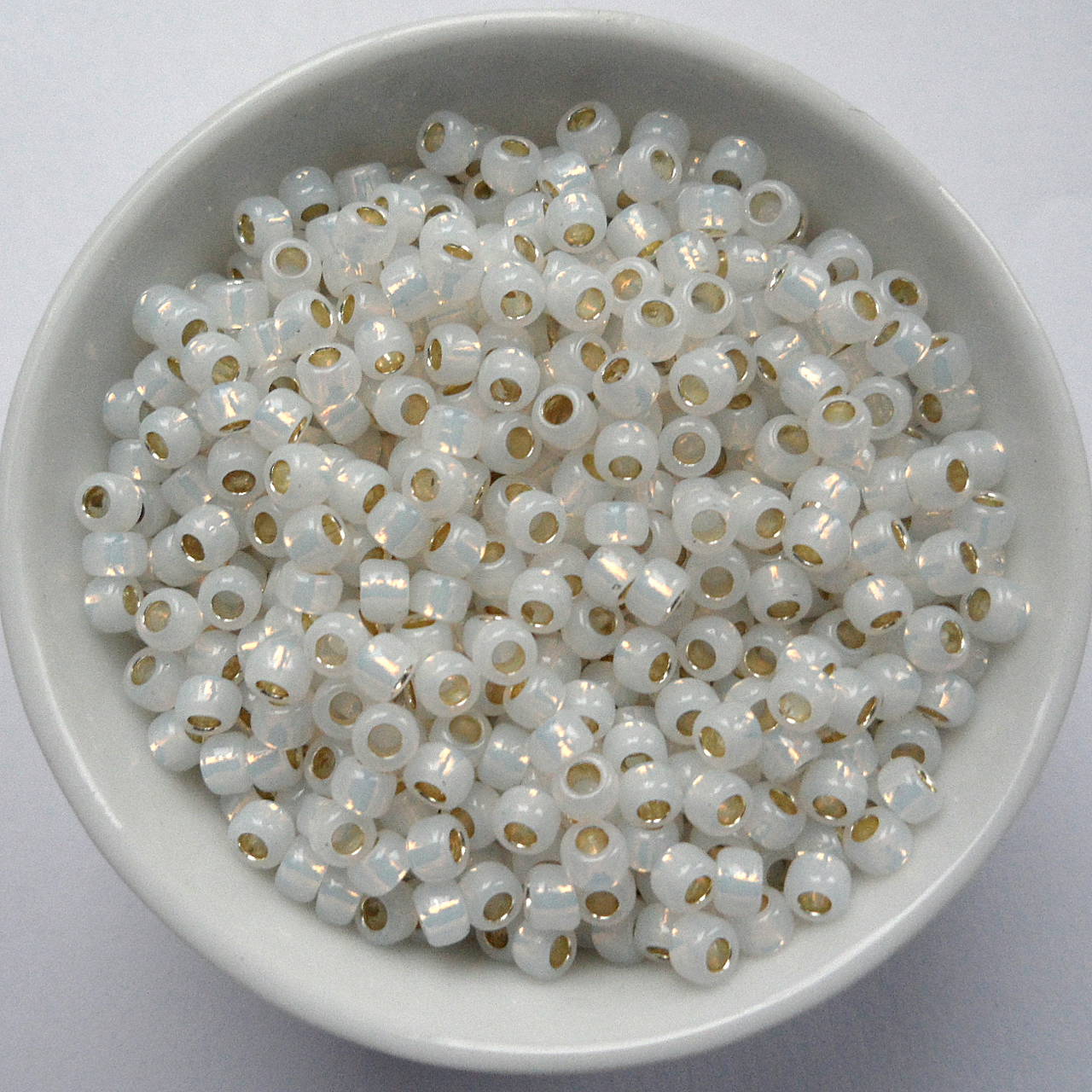TOHO round silver-lined 3mm-10g (milky white)