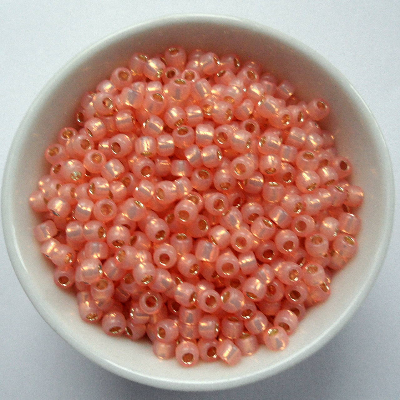 TOHO round silver-lined 3mm-10g (milky peach)