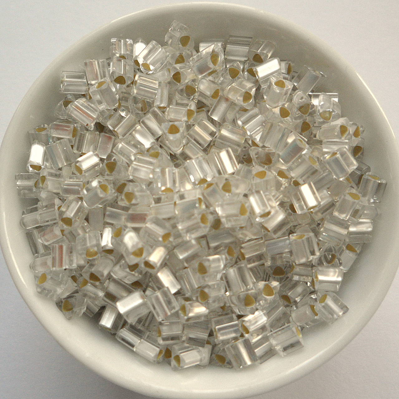 TOHO triangle 3mm-5g (silver-lined frosted crystal)
