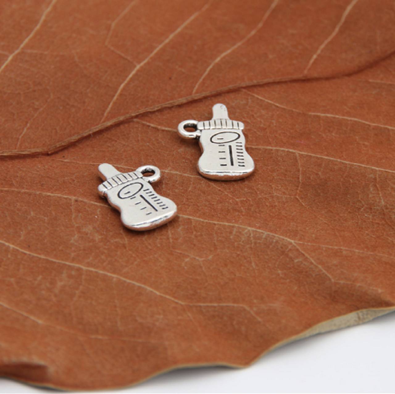 PR102 Prívesok strieborný fľaša 1,6 x 1,0 cm