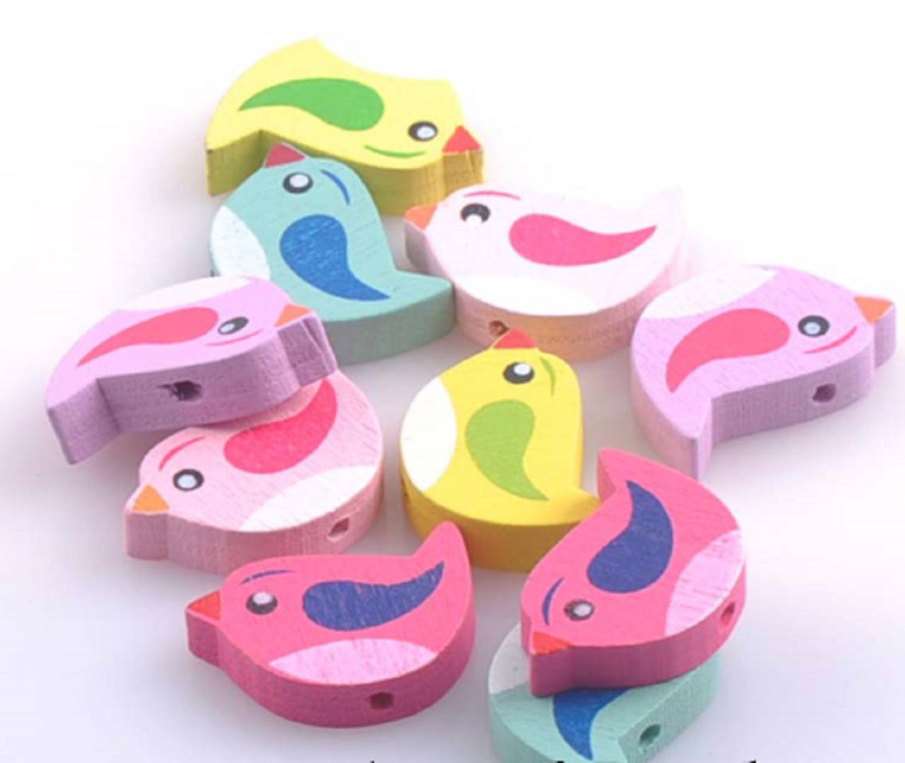 KD141 Korálka drevená VTÁČIK 2,1 x 1,5 cm