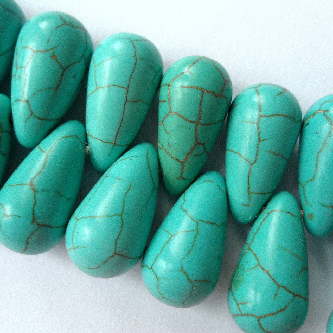 Syntetický kameň tyrkenit 12x22mm-1ks (tyrkys)