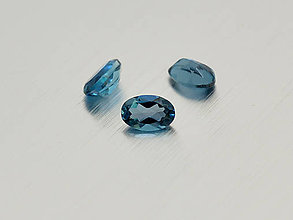 Minerály - Topás london modrý prírodný oválny 5x7 mm - 10223548_