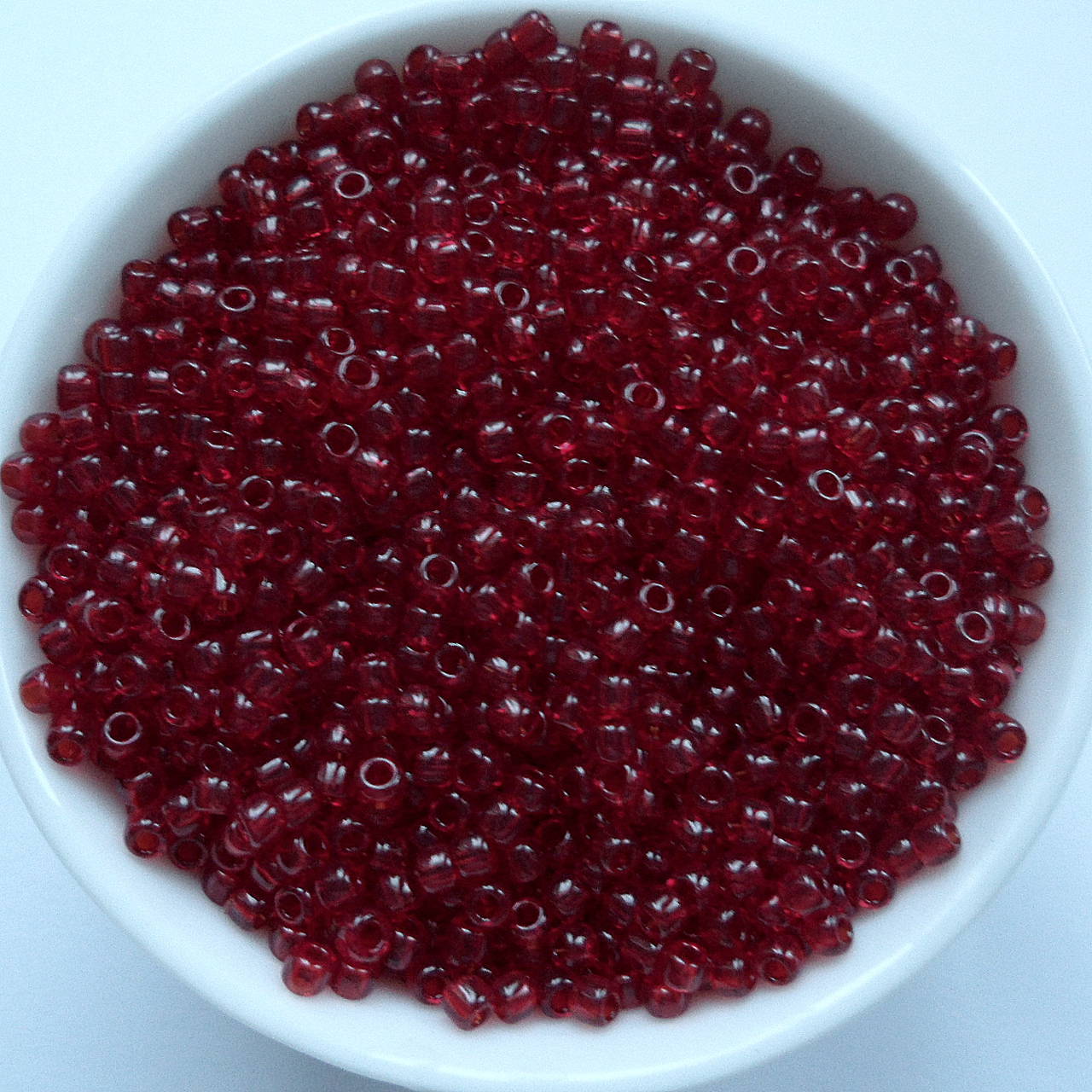 TOHO round transparent 11/0=2,2mm-10g (granát)