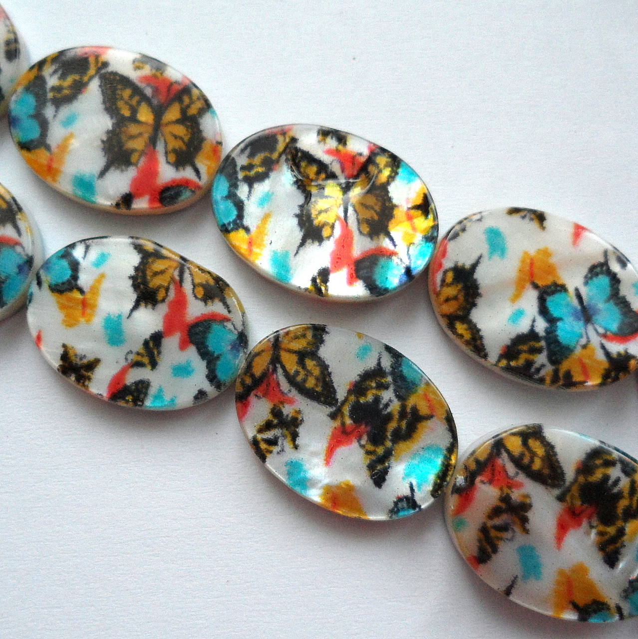 Perleťový ovál 13x18mm-1ks (motýle)