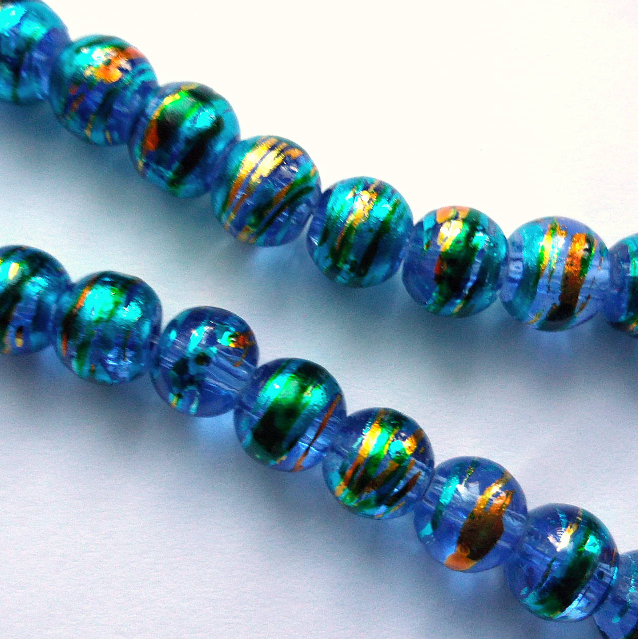 Skl.kozmos 6mm-modrá/zlatá-10ks 