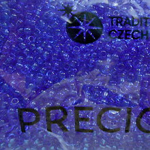 Korálky - Rokajl 11/0 PRECIOSA 2mm TRANSP-10g (modrá kobalt) - 10816233_