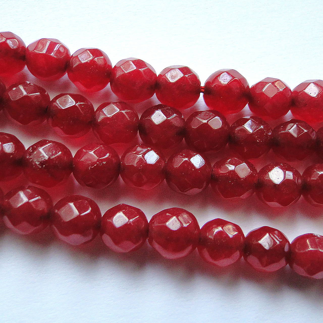 Jadeit fazet 6mm-1ks (ruby)