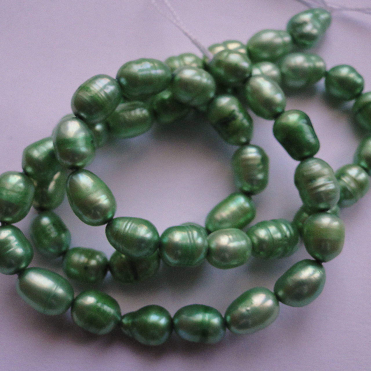 Sladkovodné perly-návlek cca 36cm (5x7mm-zelená svetlá)