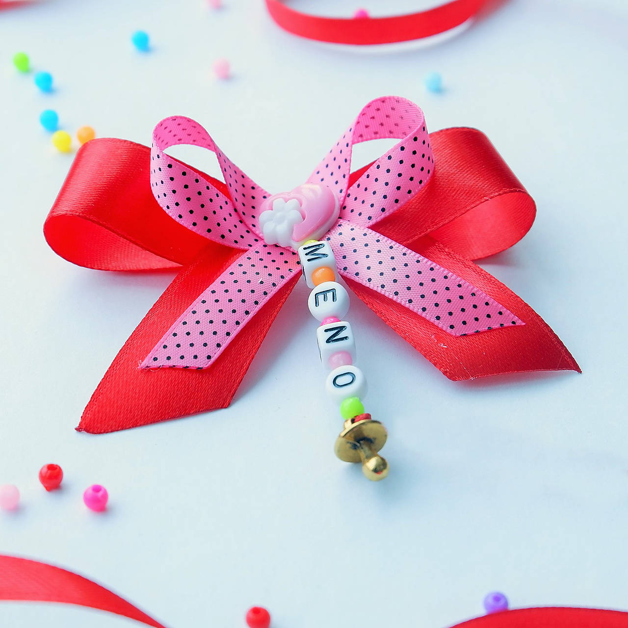 Stužka (mašlička) proti urieknutiu na kočík  (Ružová)