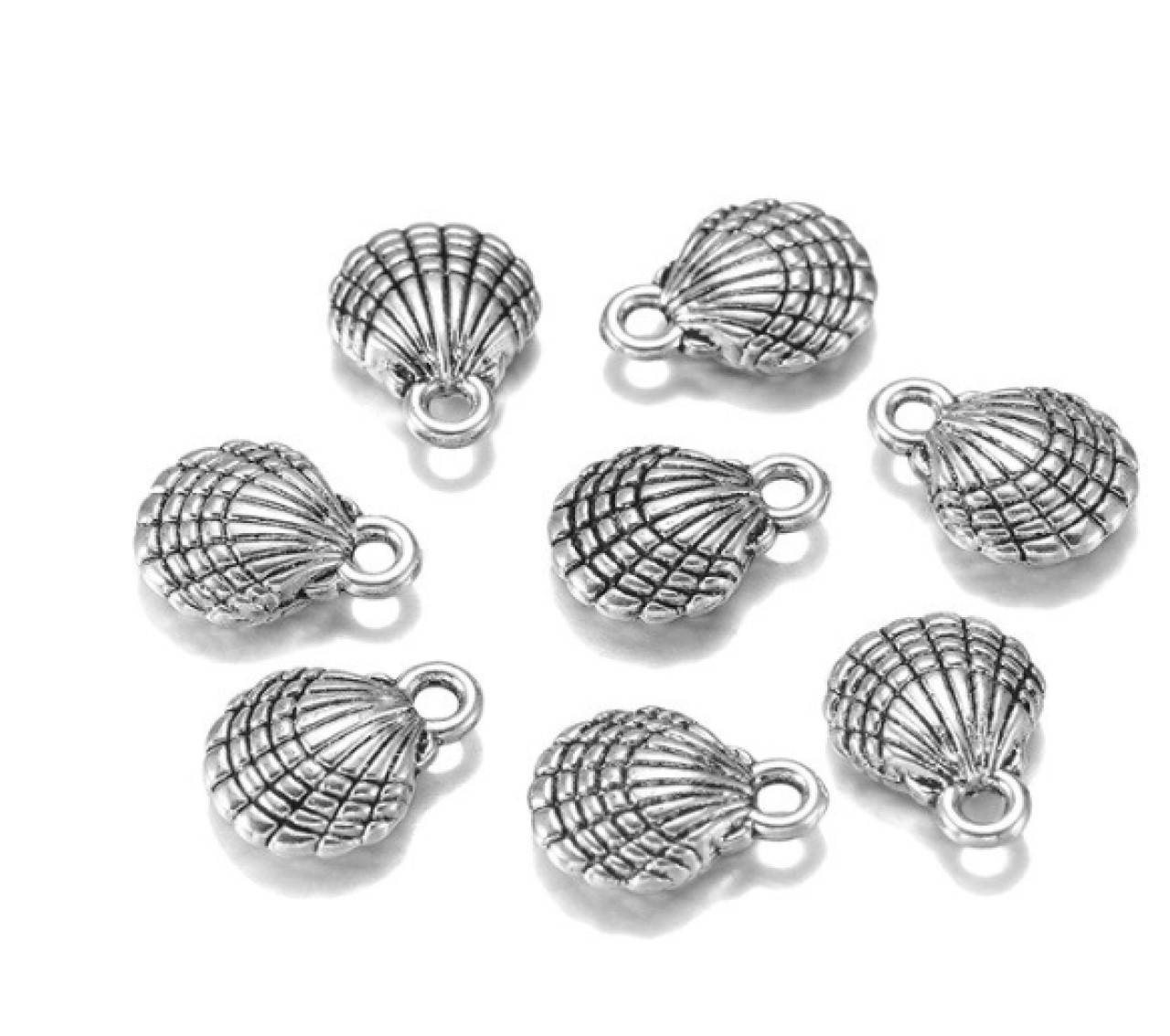 PR102 Prívesok mušlička 1,3 x 1,0 cm (Strieborná)