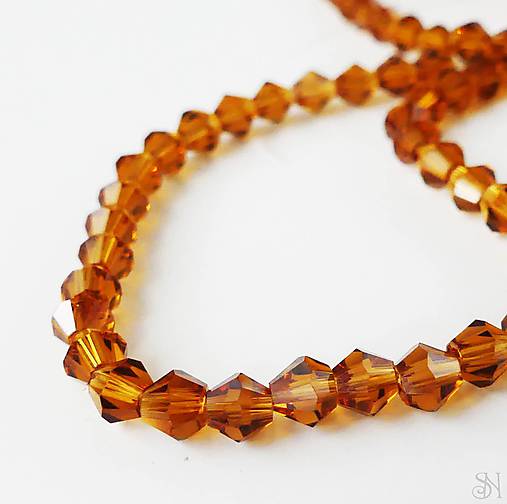 Korálky - CrystaLine bicone 4 mm sklenené korálky topaz - 10 ks - 11884890_