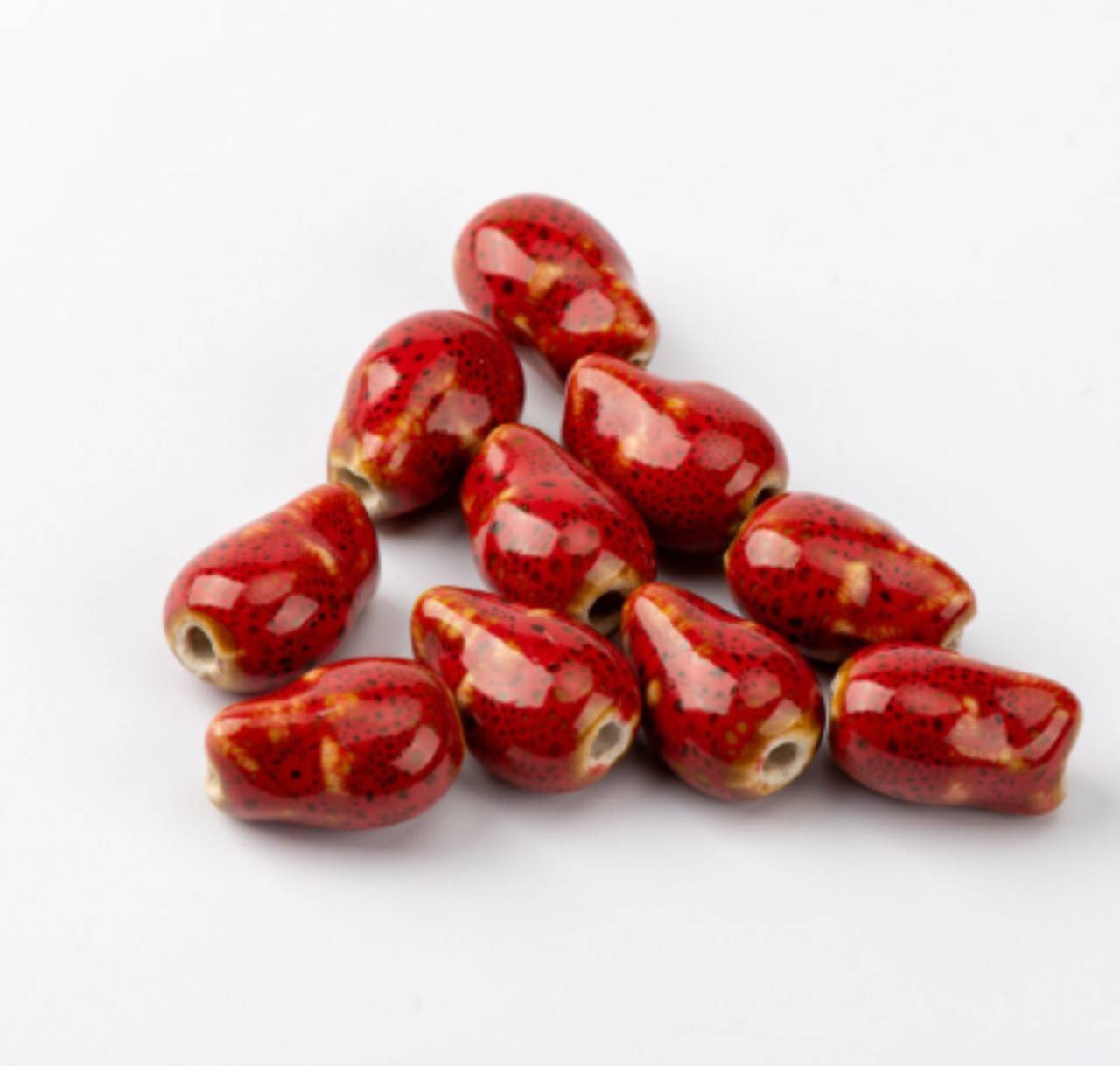 KE103 Korálka keramická 1,0 x 1,2 x 1.6 cm