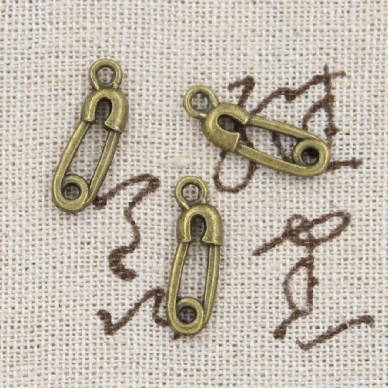 PR102 Prívesok zicherka 1,9 x 0,6 cm (Meď/Bronz)