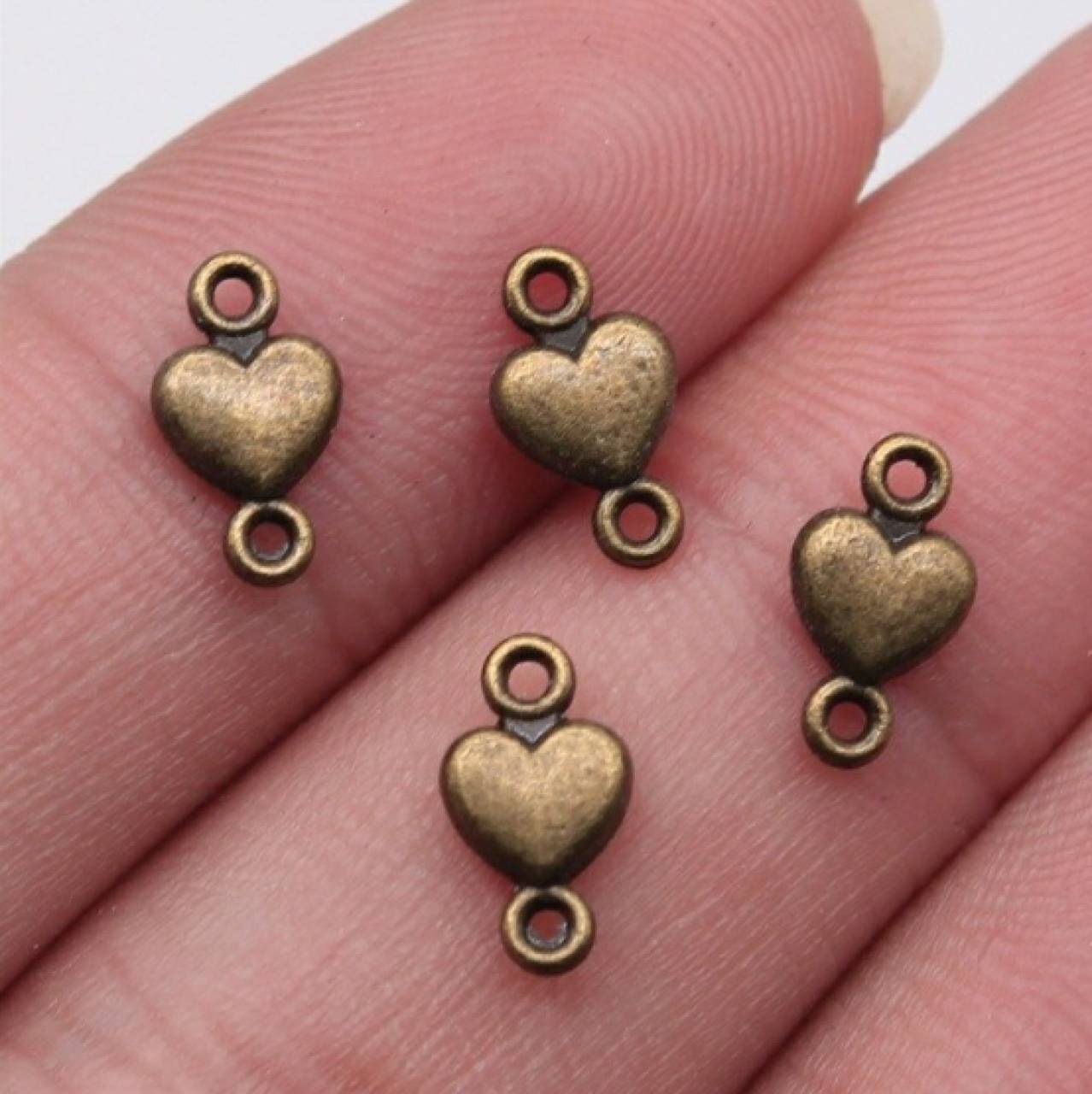 CO104 Konektor strieborný srdiečko 1 x 0,5 cm  (Meď/Bronz)