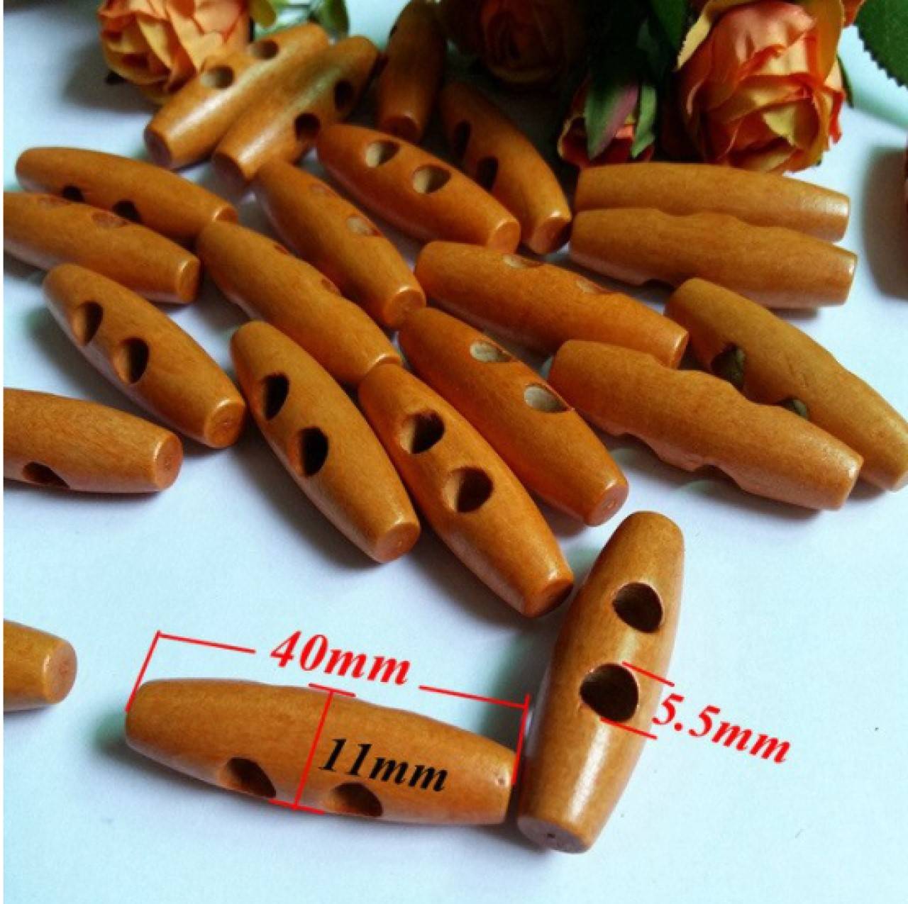 G112 Gombík kabátový 1,1 x 4 cm (Čerešńový)