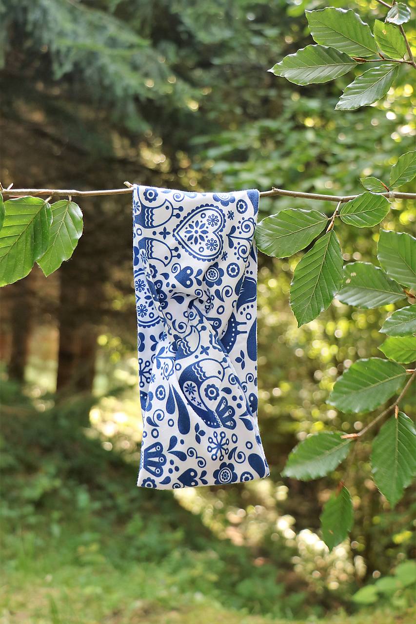 Prekrížená úpletová čelenka vtáčik bielomodrý