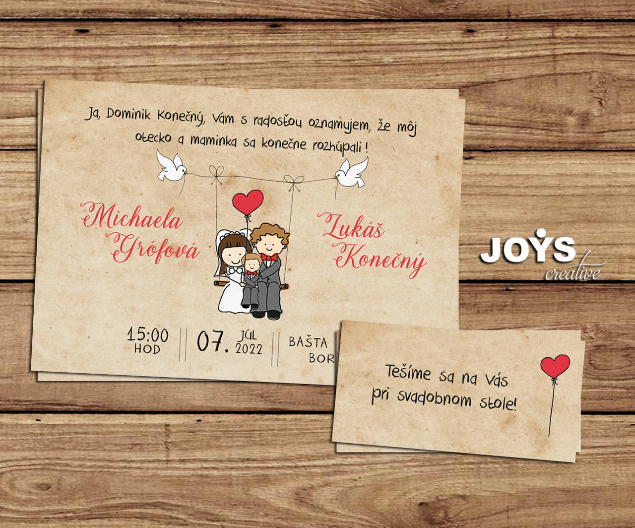 Svadobné oznámenie s kreslenými postavičkami na hojdačke, "Oni sa konečne rozhúpali"