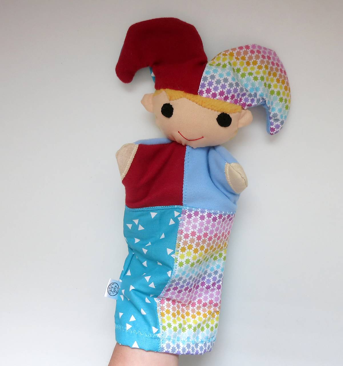 Maňuška pajác s cinkajúcou čiapkou (s farebnými hviezdičkami)