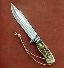 Príbory, varešky, pomôcky - Wolf bouwie - veľký lovecký nôž - 16536560_