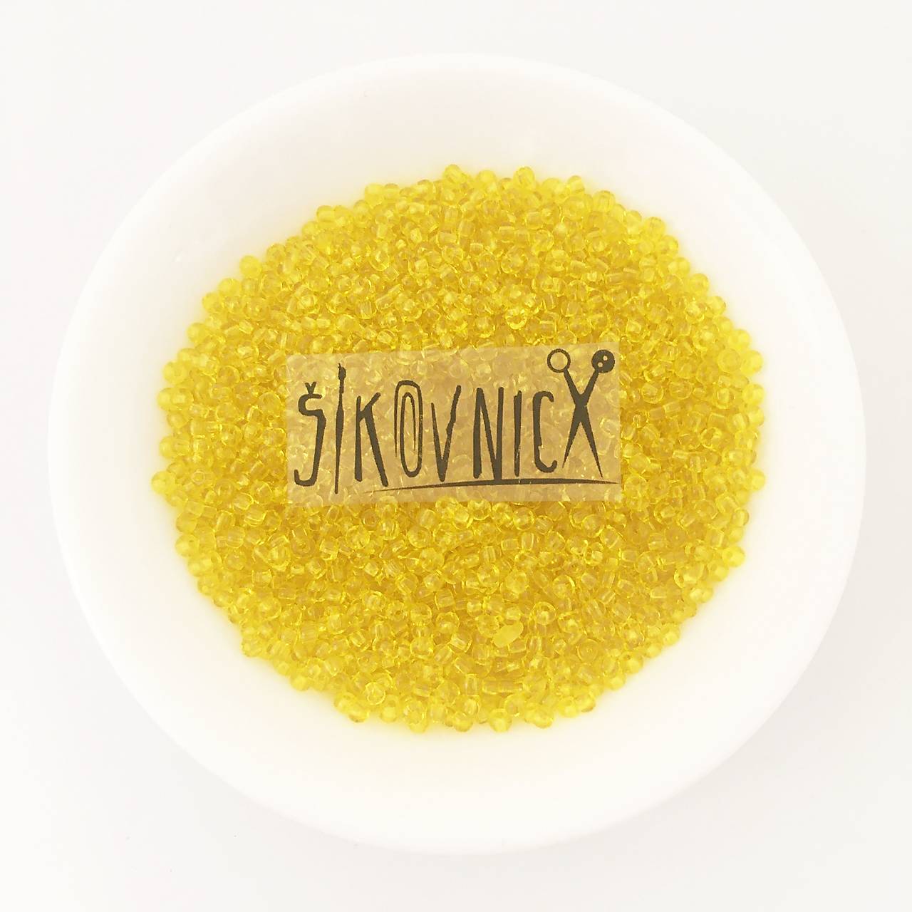 10/0 rokajl PRECIOSA  - 50 g (643 priehľadná žltá)