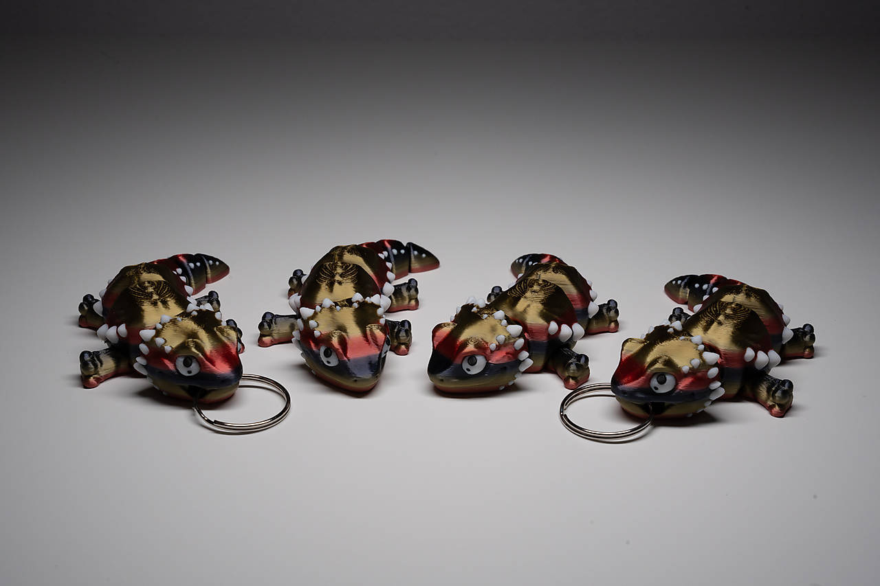 Originálny Gekóni aj ako prívesky