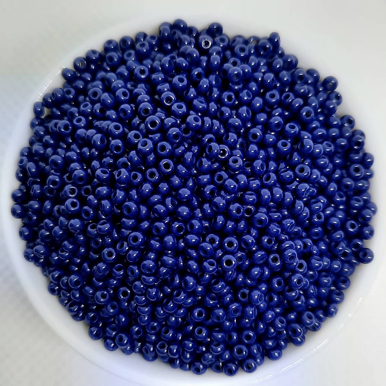 Rokajl 11/0 PRECIOSA 2mm-10g (modrá tmavá)