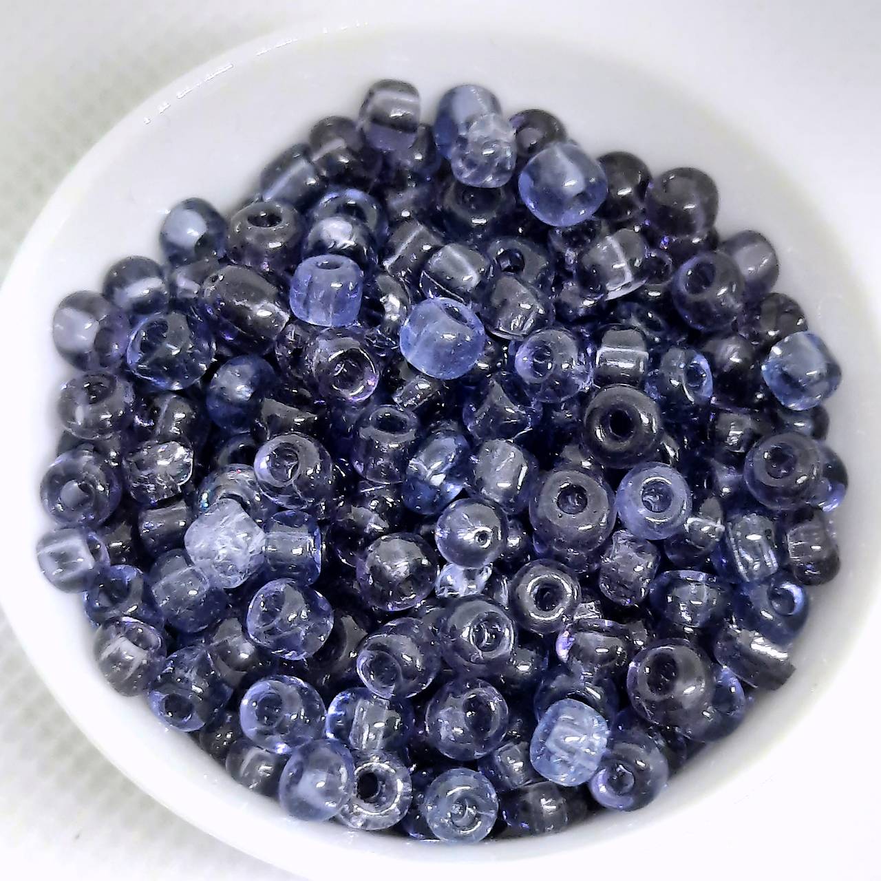 Rokajl 4mm TRANSP-20g (fialová)