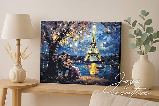 Svietiaci obraz pár s gitarou pod Eiffelovou vežou