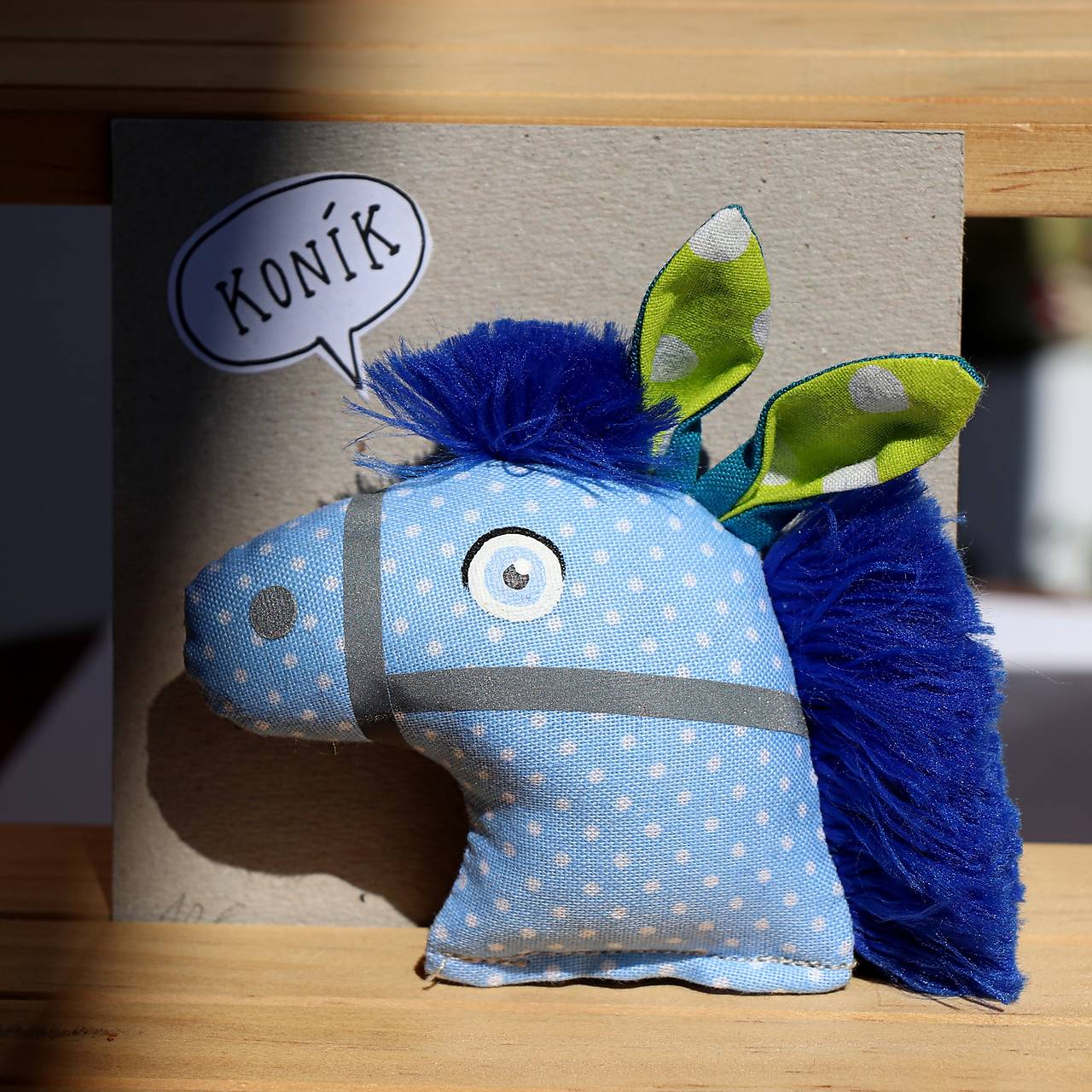 Reflexná brošňa Koník