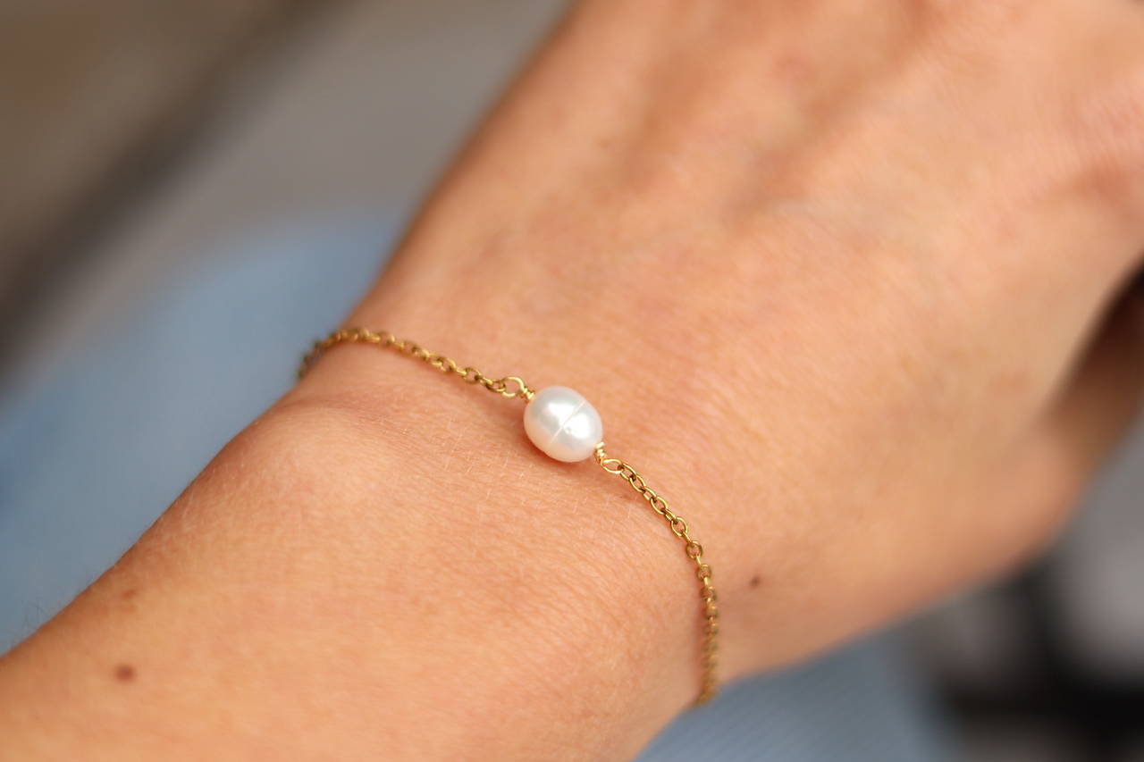 Tenký retiazkový náramok s perlou