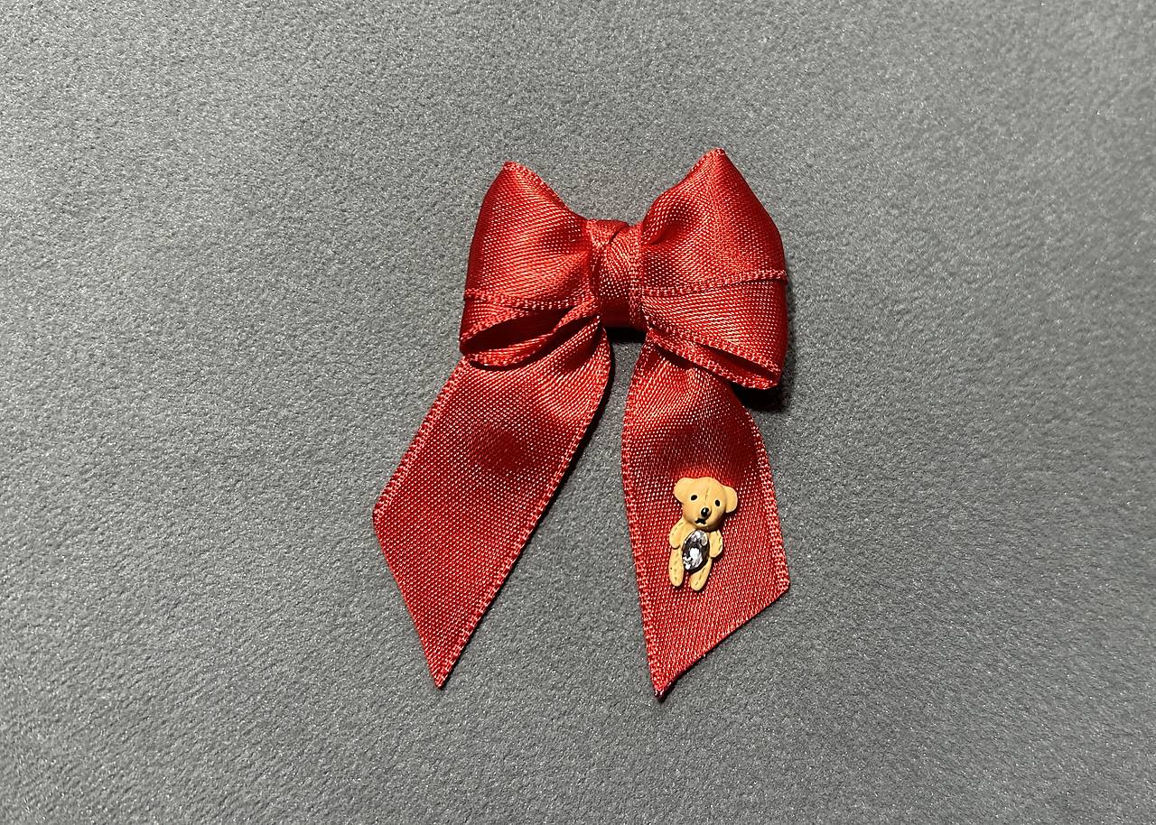 Mašlička proti urieknutiu na kočík/vajíčko s hnedým mackom so zirkónom