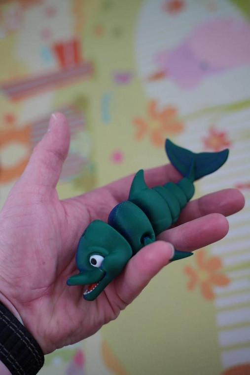 Zeleno-modrý usmiaty delfín – hravá ohybná figúrka