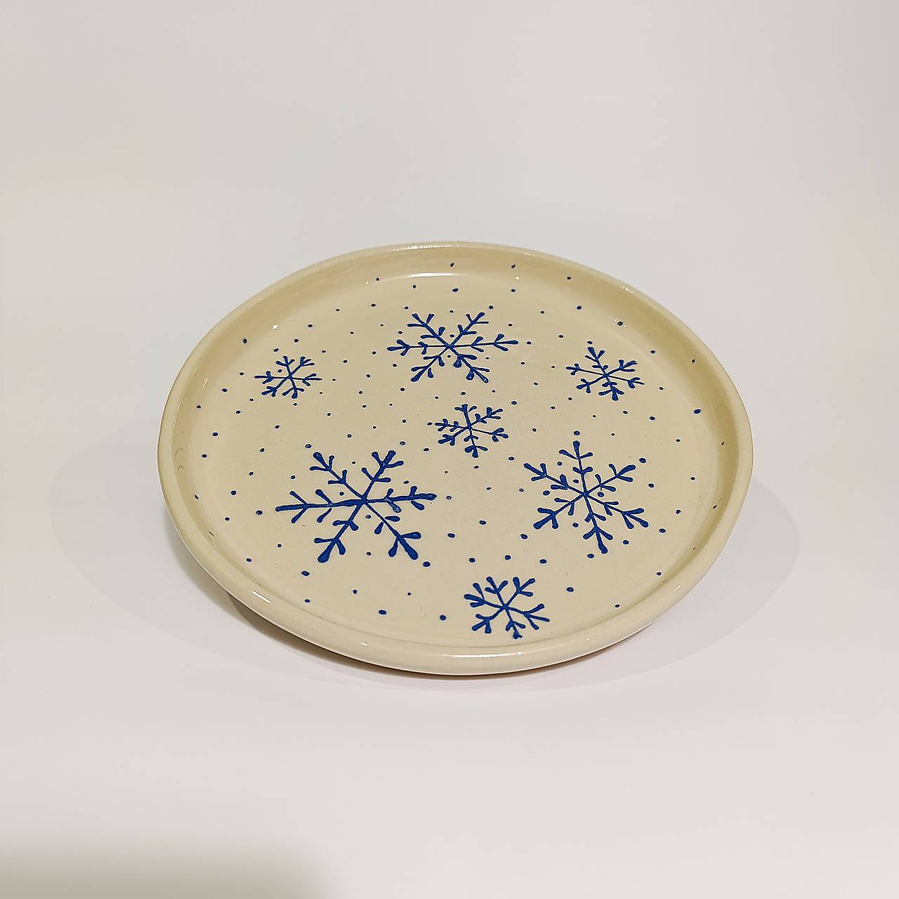 Tanier s modrými vločkami