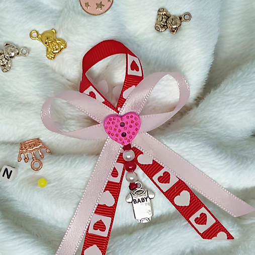 Stužka (mašlička) proti urieknutiu na kočík s príveskom