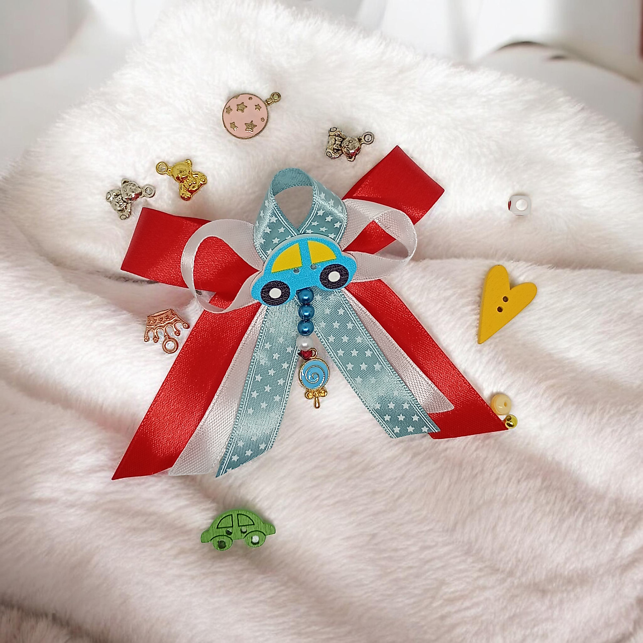 Stužka (mašlička) proti urieknutiu na kočík s príveskom