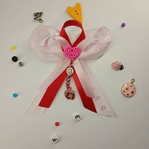 Stužka (mašlička) proti urieknutiu na kočík s príveskom