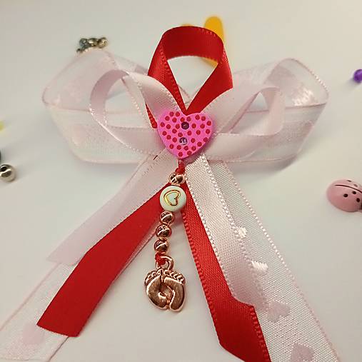 Stužka (mašlička) proti urieknutiu na kočík s príveskom